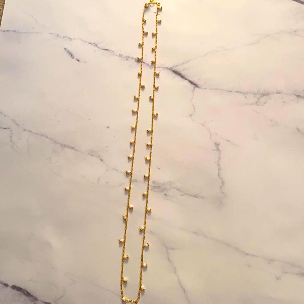 White beaded necklace. Great for layering!